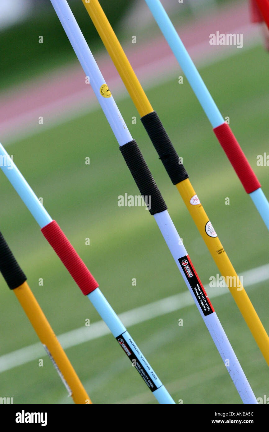 Five javelins lying on the grass Stock Photo Alamy