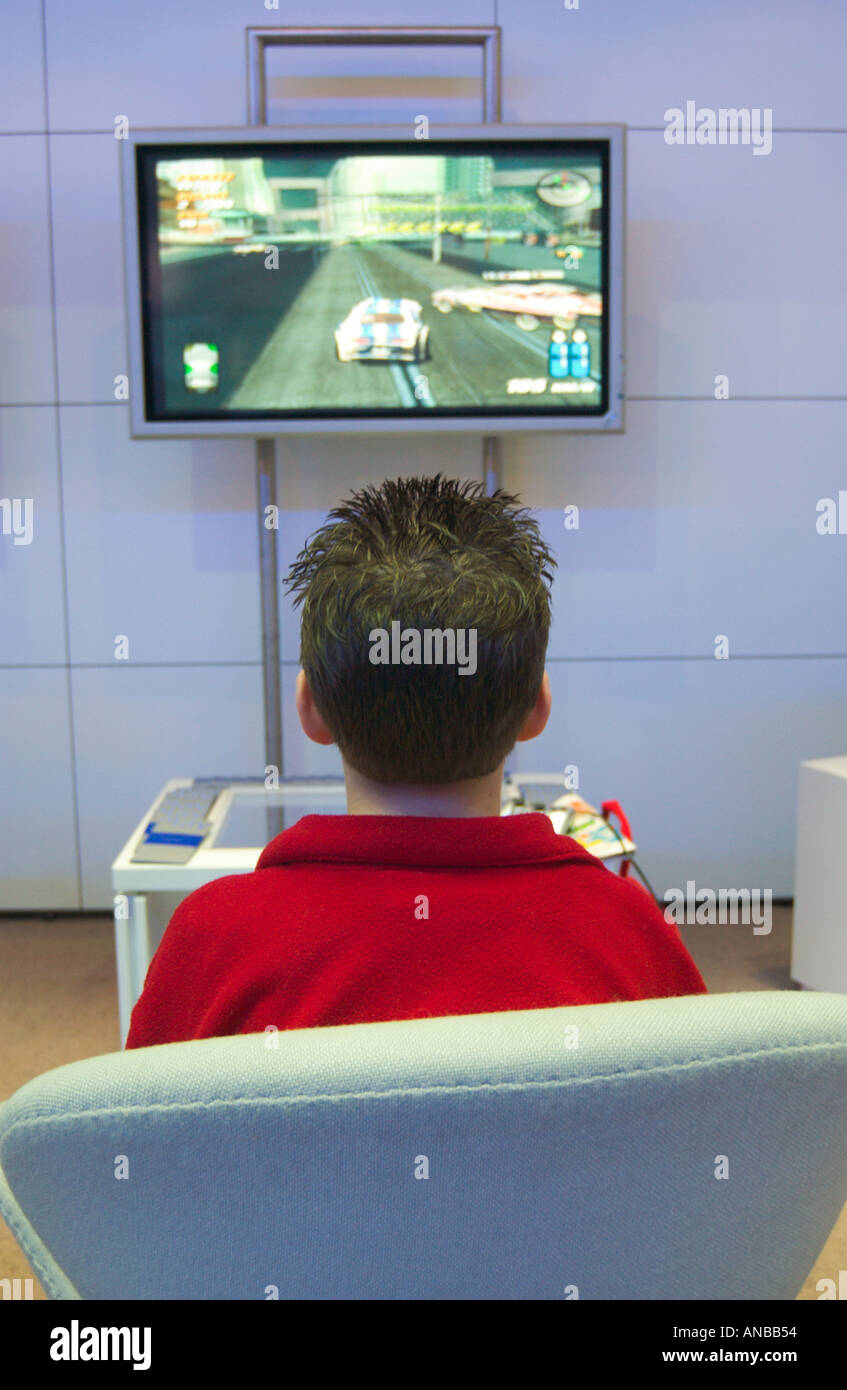 boy playing video game Stock Photo