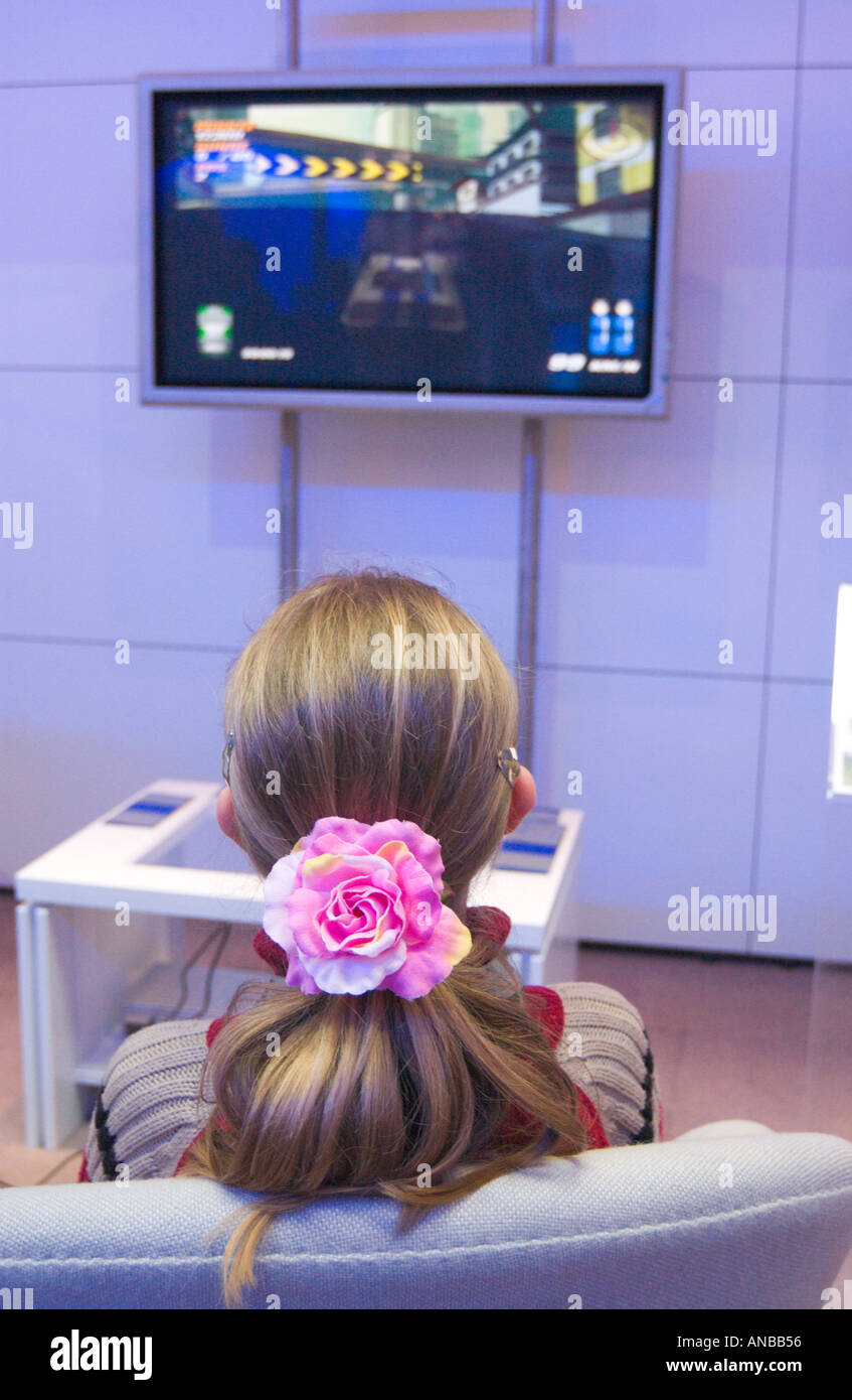 girl playing video game Stock Photo