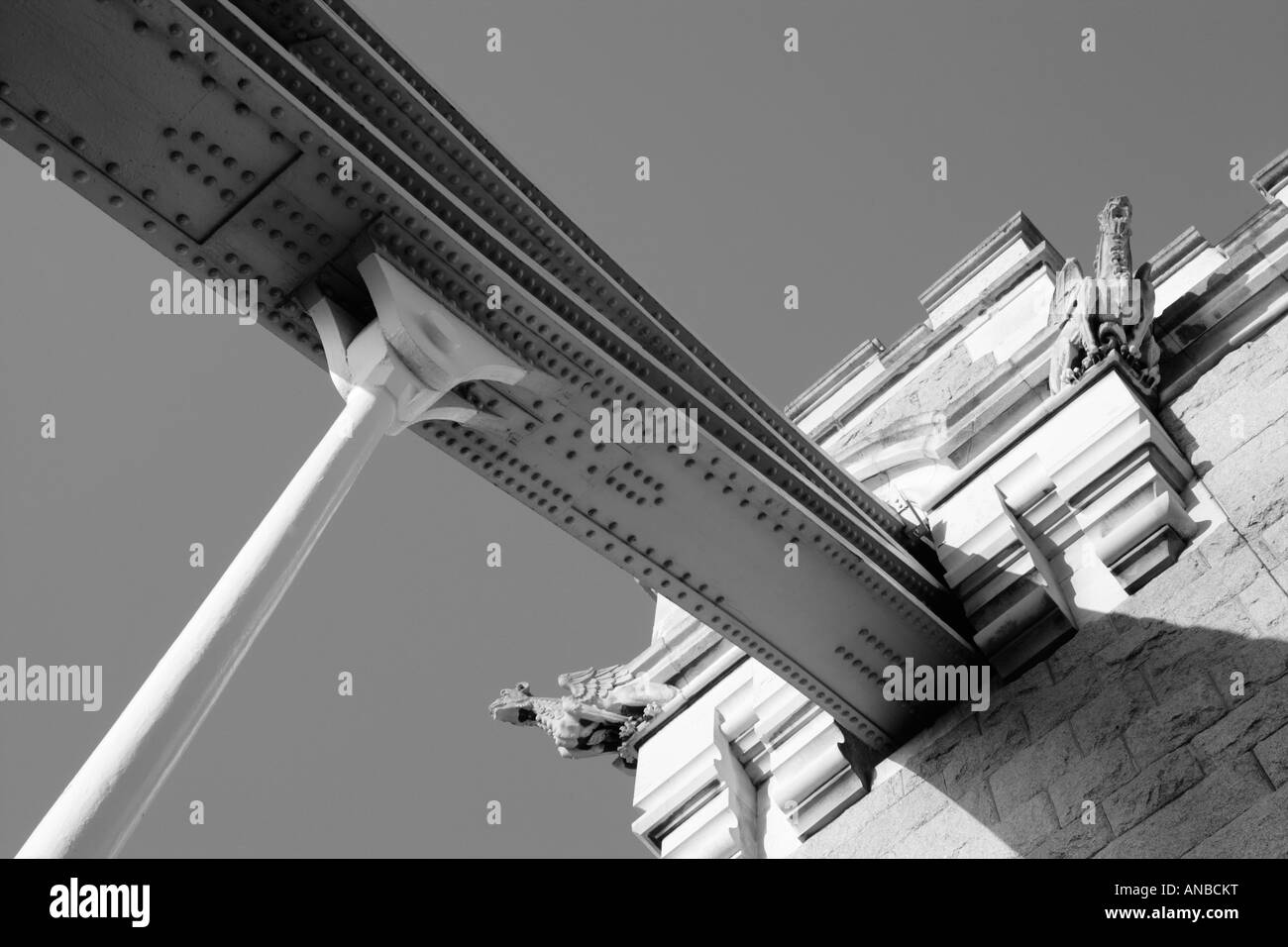 suspension arm Tower bridge Black and white supporting pillars battlements gargoyles London England Londres tourism Tourists Stock Photo