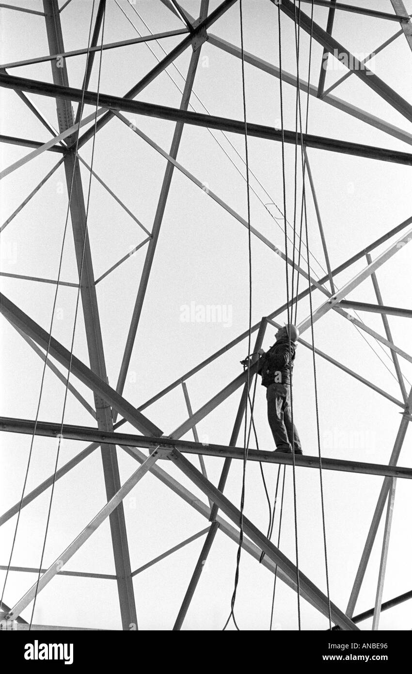 Construction worker building a power line Stock Photo Alamy