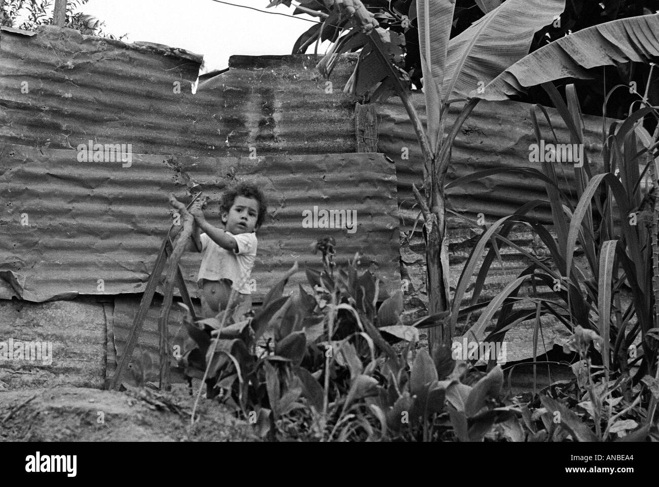 A boy in a slum above the capital city of Venezuela, Caracas Stock Photo
