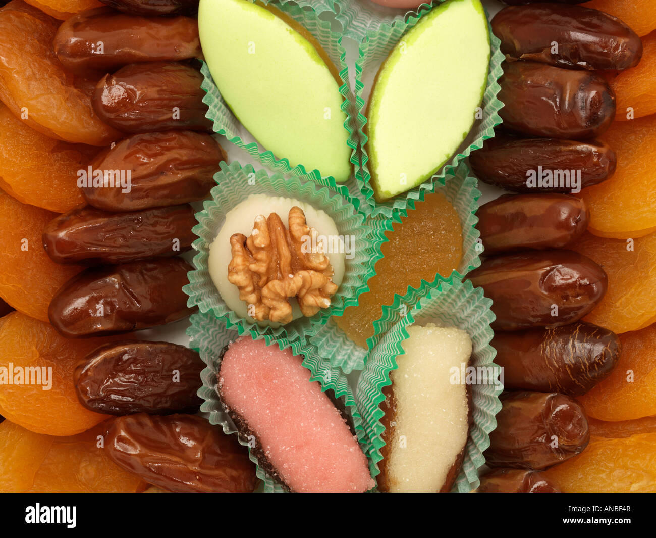 Dried Fruit Apricots Dates Figs Prunes Marzipan and Walnuts Stock Photo