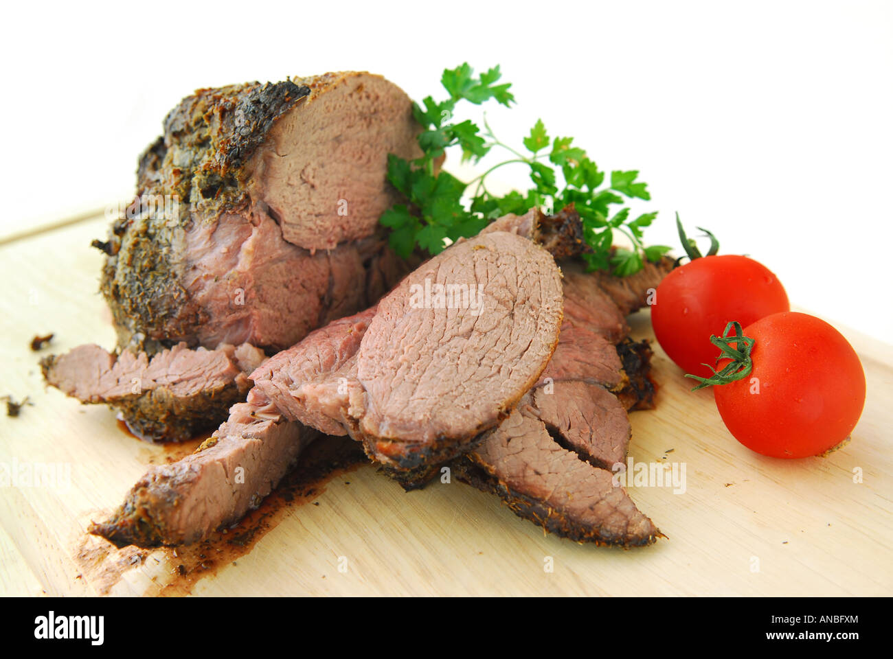 Beef roast cut on a cutting board Stock Photo Alamy