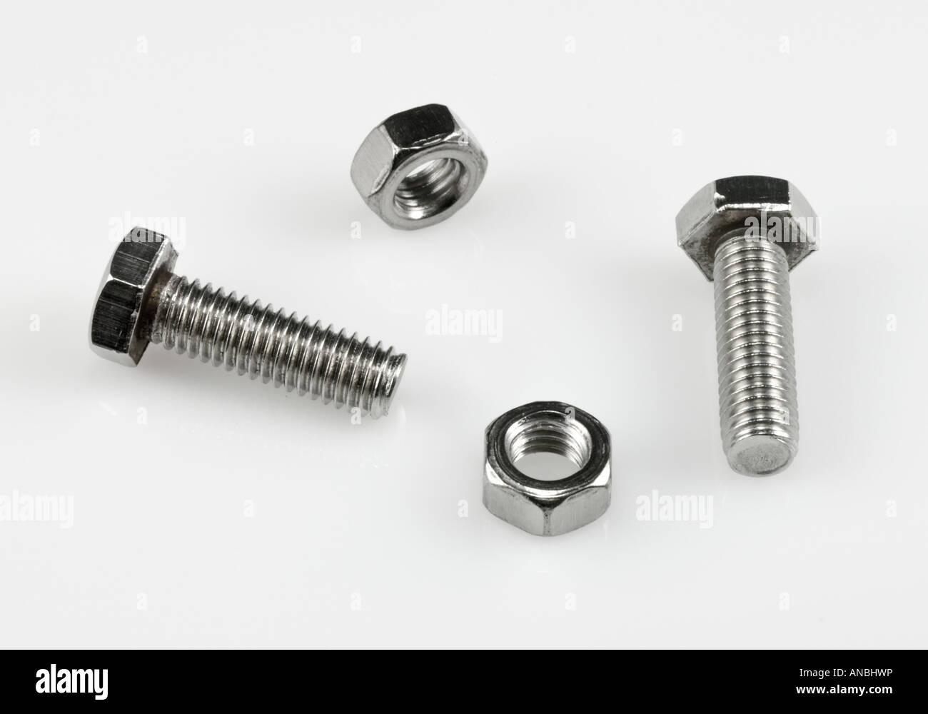 nuts and bolts threads fasteners metal parts threaded Stock Photo
