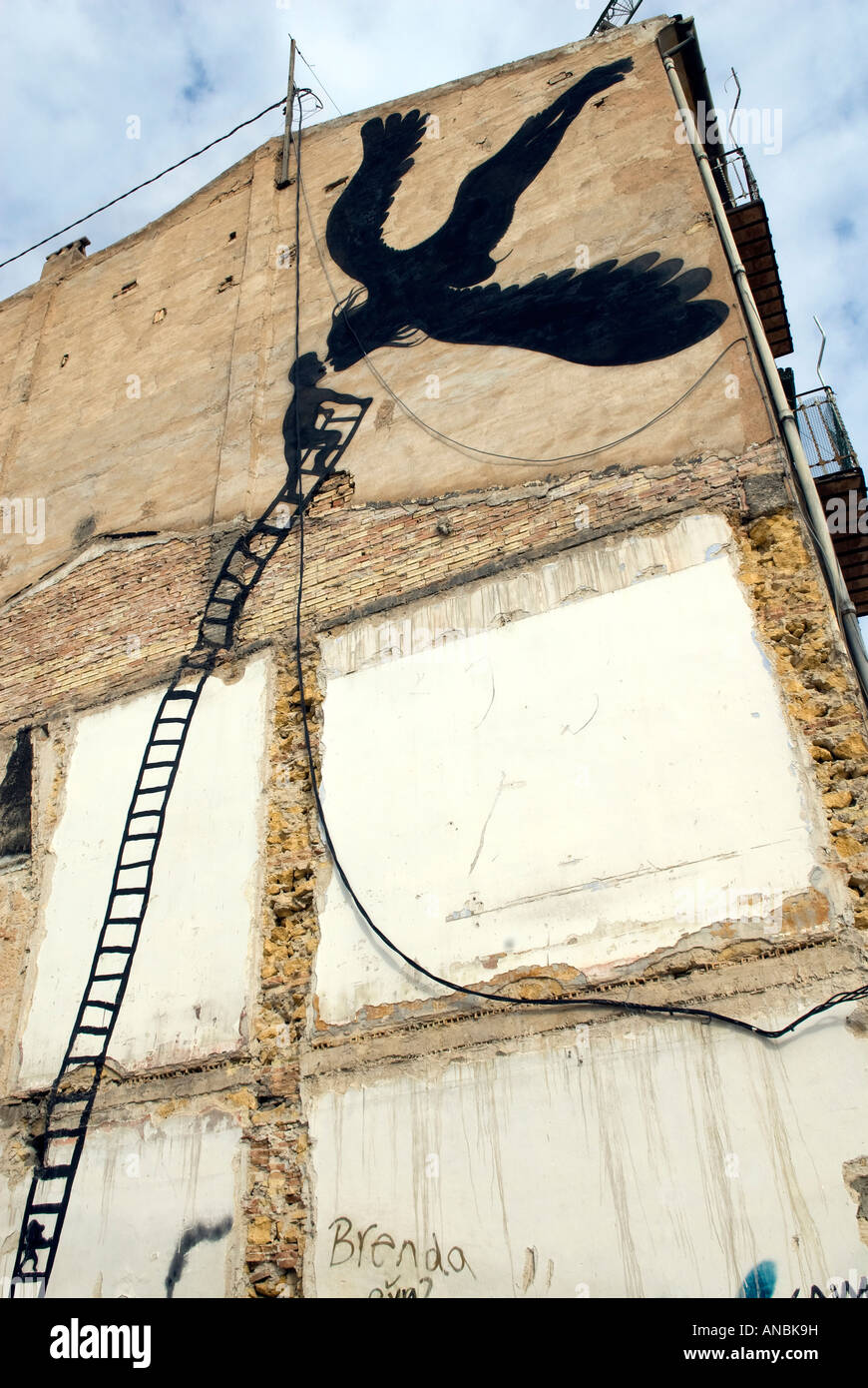 abstract art on building wall, black flying angel Stock Photo