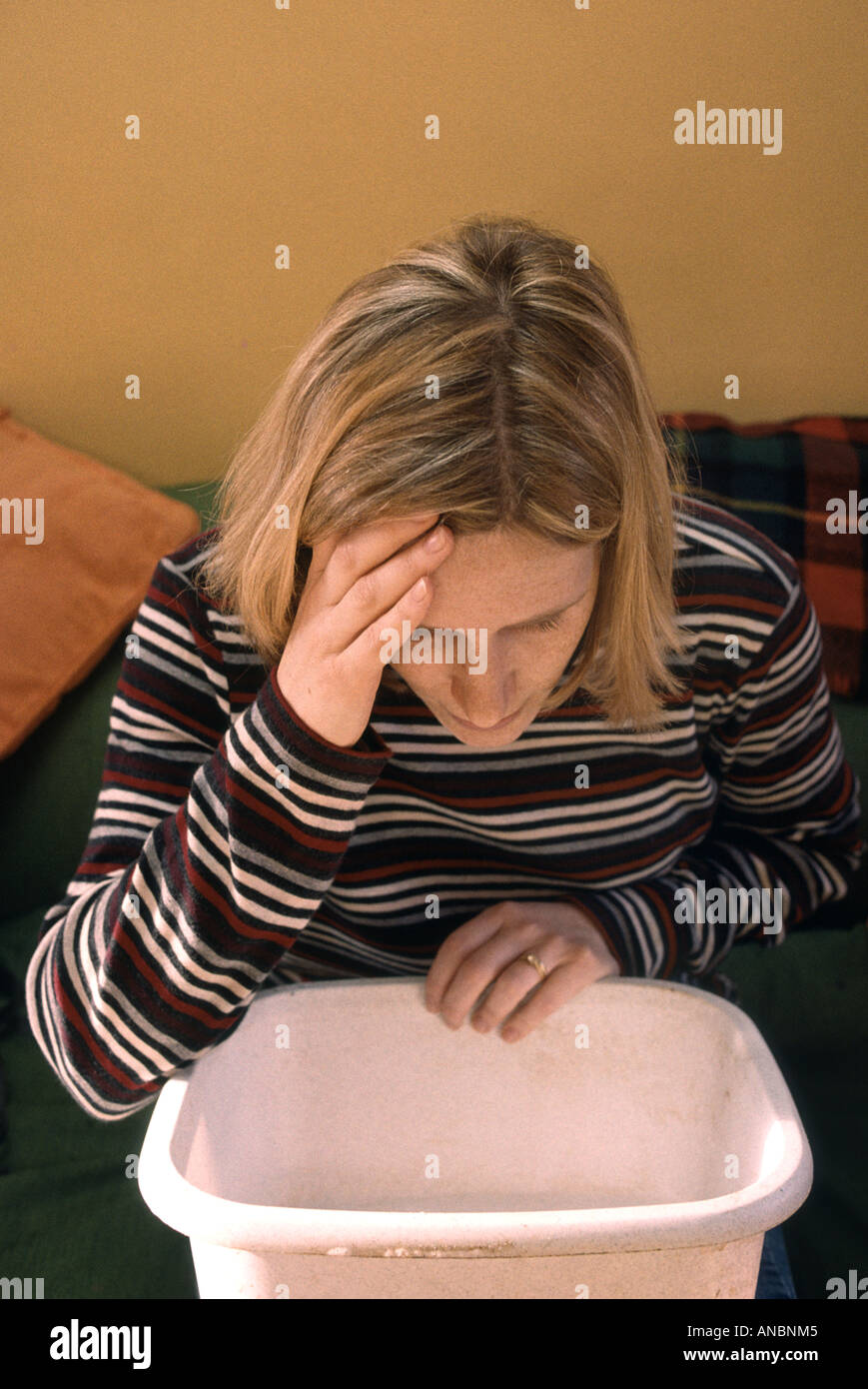 pregnant woman in her first trimester suffering from morning sickness Stock Photo