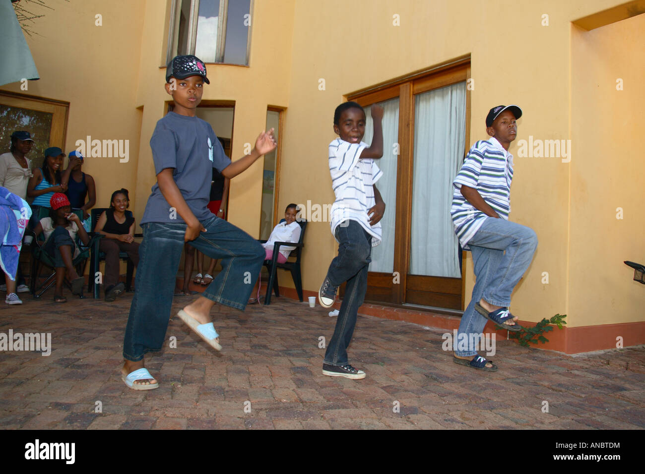 Young boys dancing at a party Stock Photo