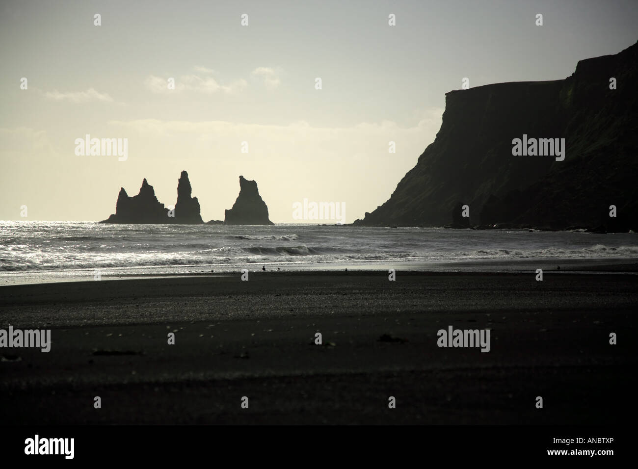Silhouetted sea stacks Vik Iceland Stock Photo - Alamy