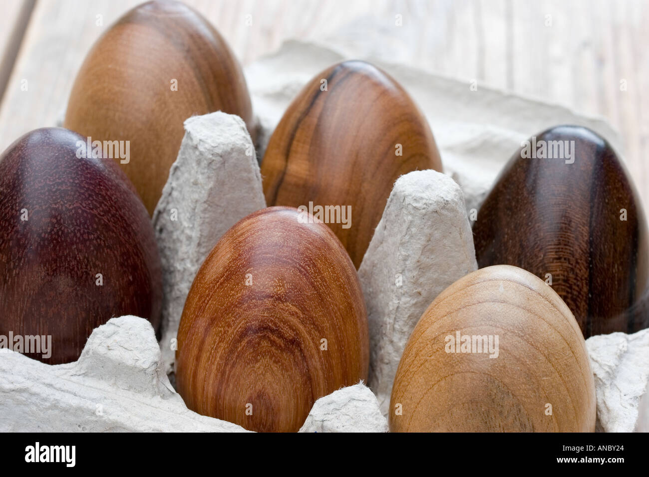 Wooden Eggs in Egg Box Stock Photo