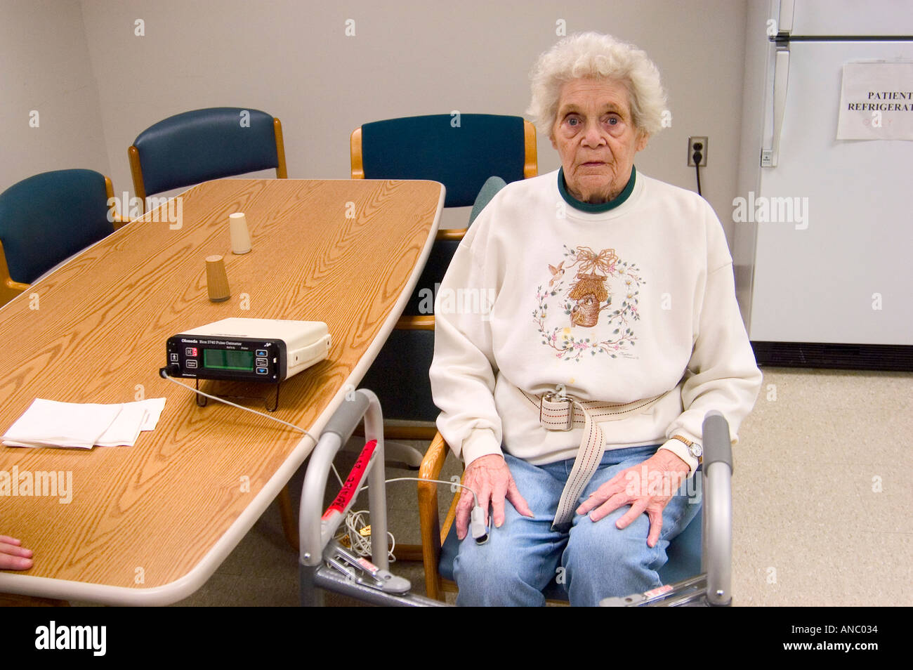 Senior Female Rehabilitates After Suffering Stroke Stock Photo