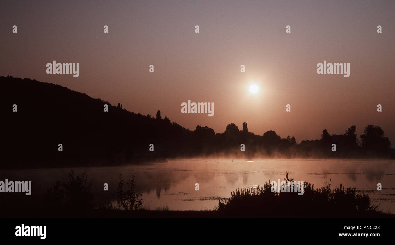 Mist rising over lake hi-res stock photography and images - Alamy