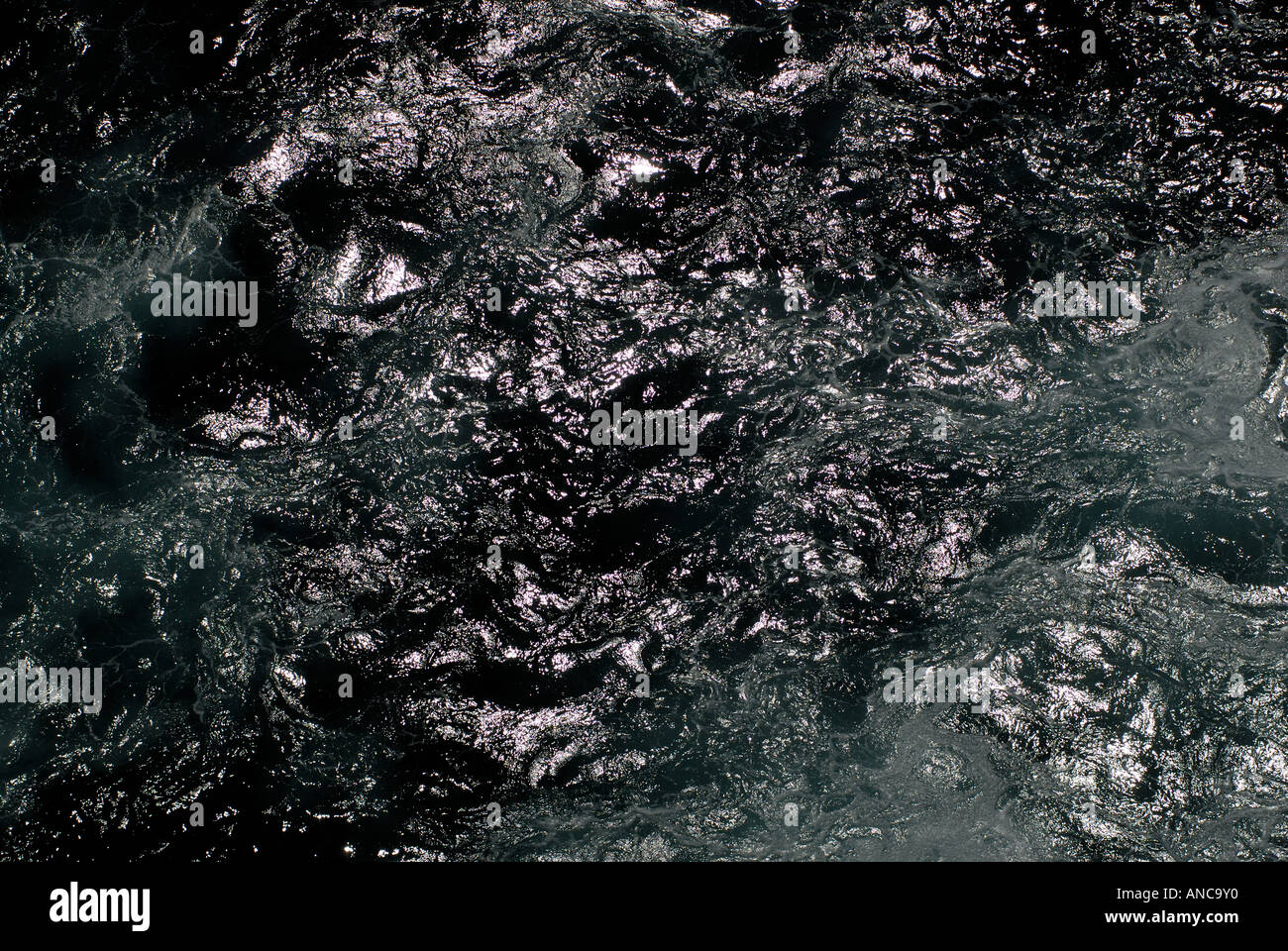 Abstract black sea water Stock Photo - Alamy