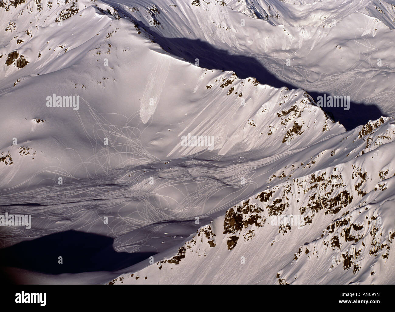 Snowmachine tracks in the Talkeetna Mountains Stock Photo Alamy