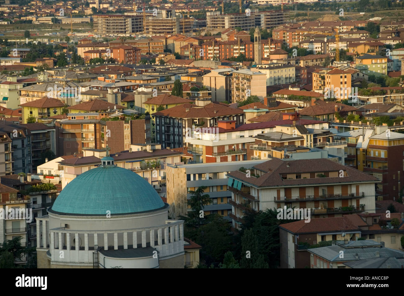 Early morning light on the Italian town of Bergamo, as seen from the fortified old town on a hilltop. Stock Photo