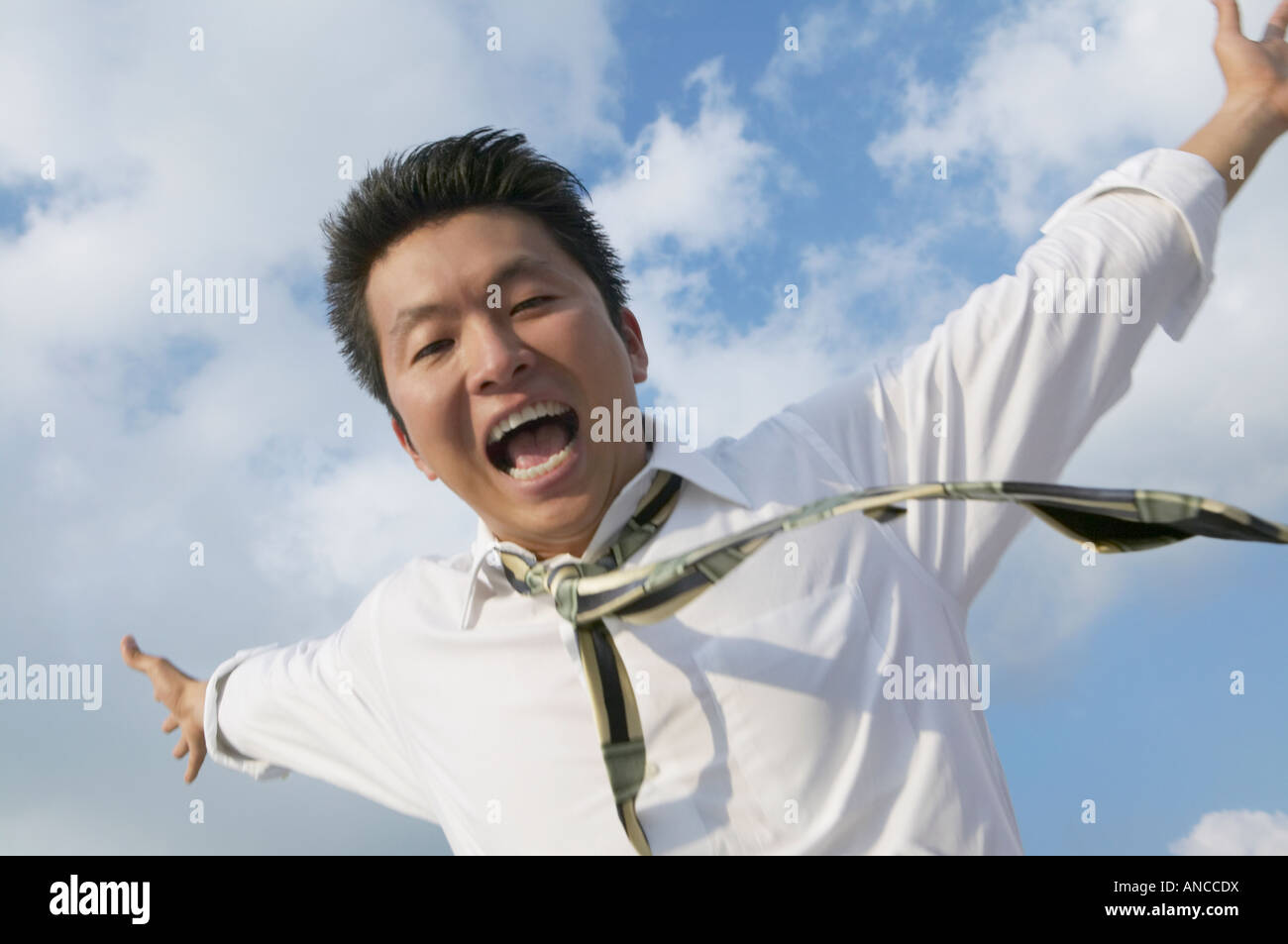 Asian man outstretched arms hi-res stock photography and images - Alamy