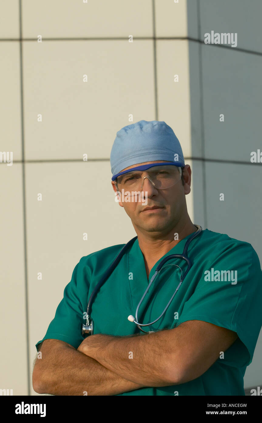 Hispanic male doctor standing outdoors hi-res stock photography and ...