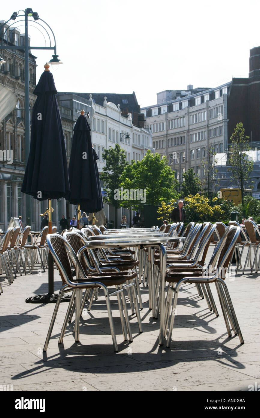 Chairs outside Obscura cafe, Bournemouth Square, Dorset, England, UK Stock Photo
