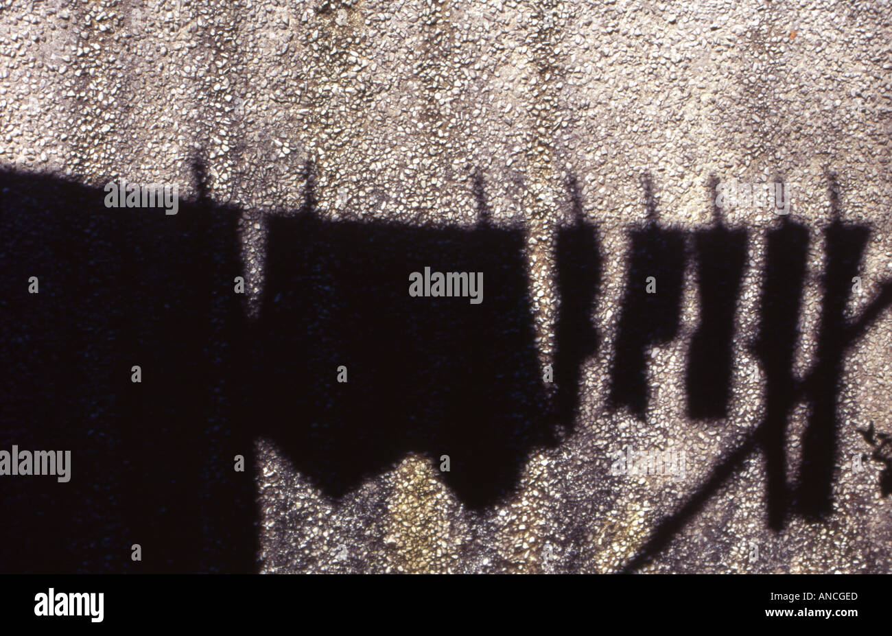 shadow of washing line on wall number 2253 Stock Photo