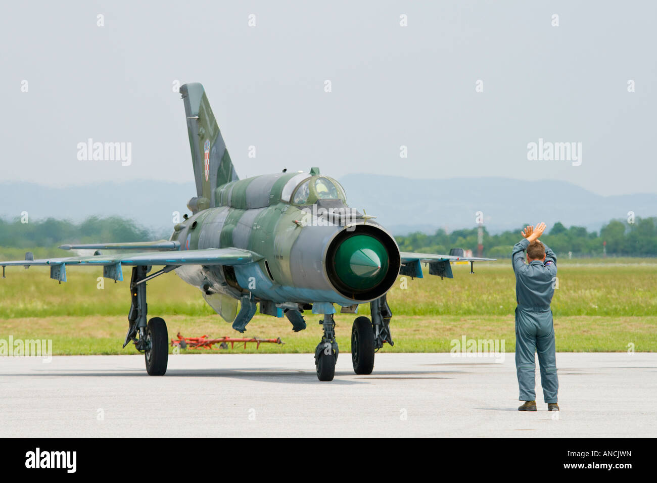Croatian Air Force MiG-21 BISD fighter shutting down engine on mechanic hand signal, Pleso AFB during 'open day' visit in 2007 Stock Photo