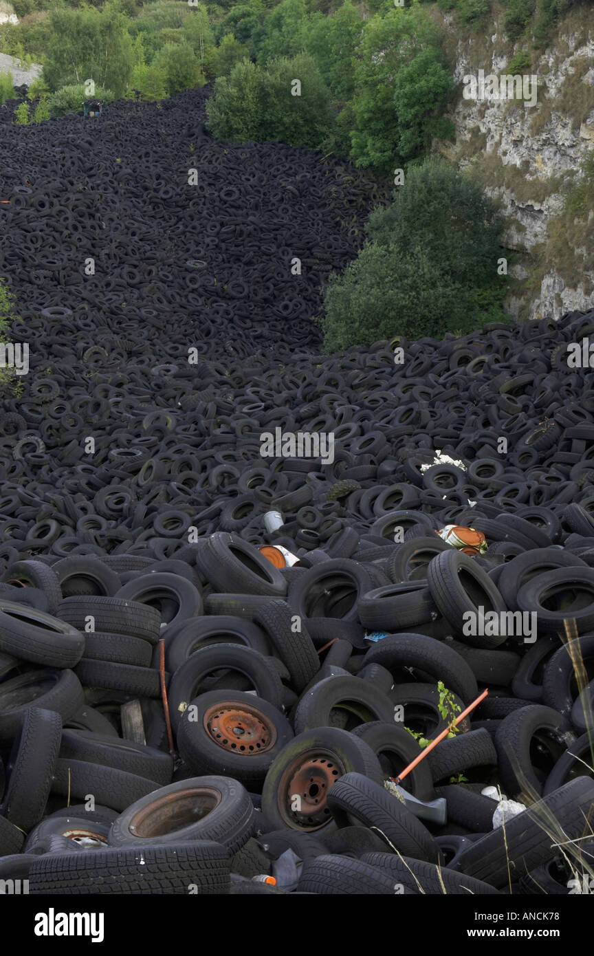 Illegal tyre dump in disused quarry Wakefield Stock Photo Alamy
