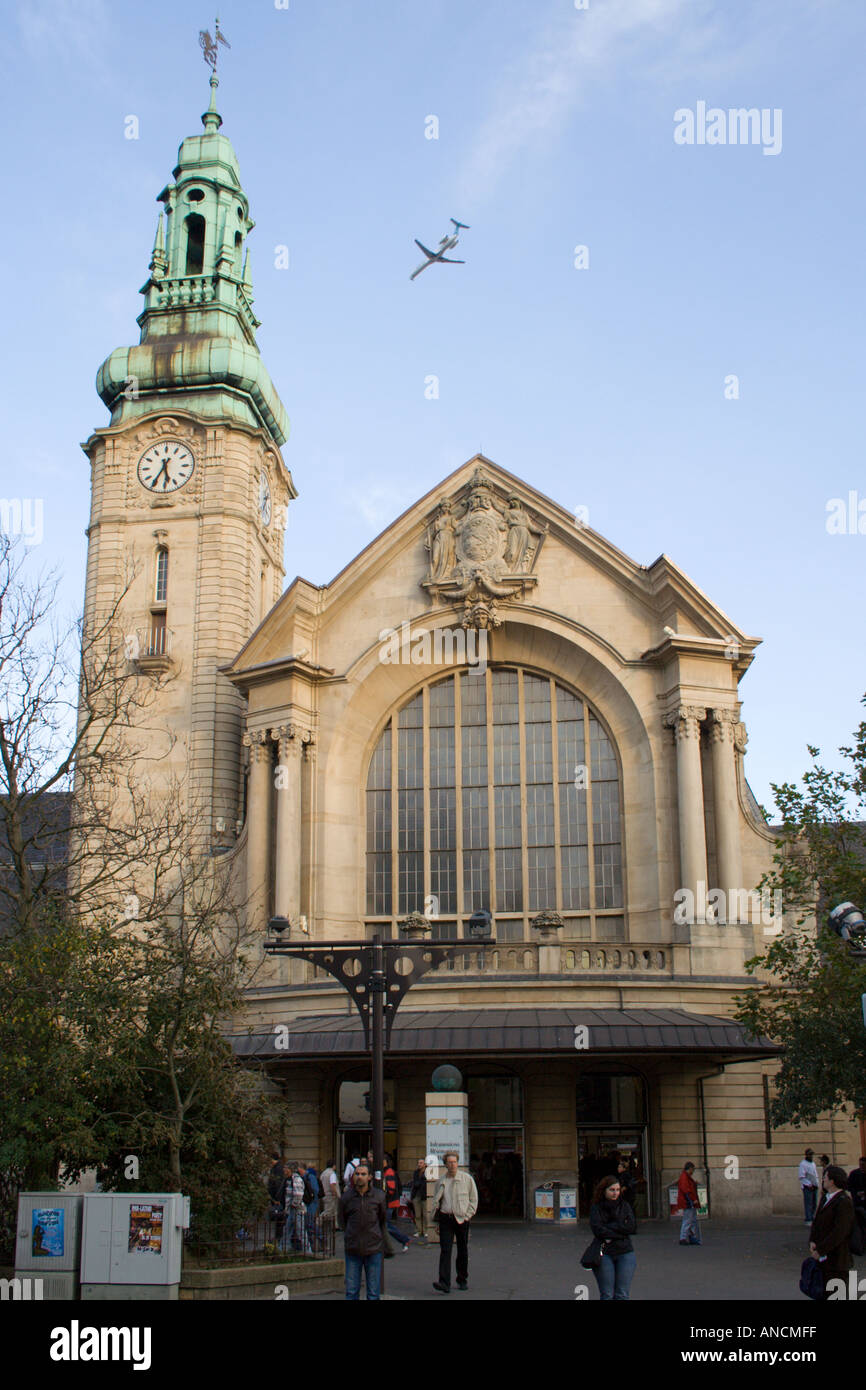 Gare Centrale, Luxembourg City central railway station building front view, Grand Duchy of Luxembourg with plane flying overhead Stock Photo