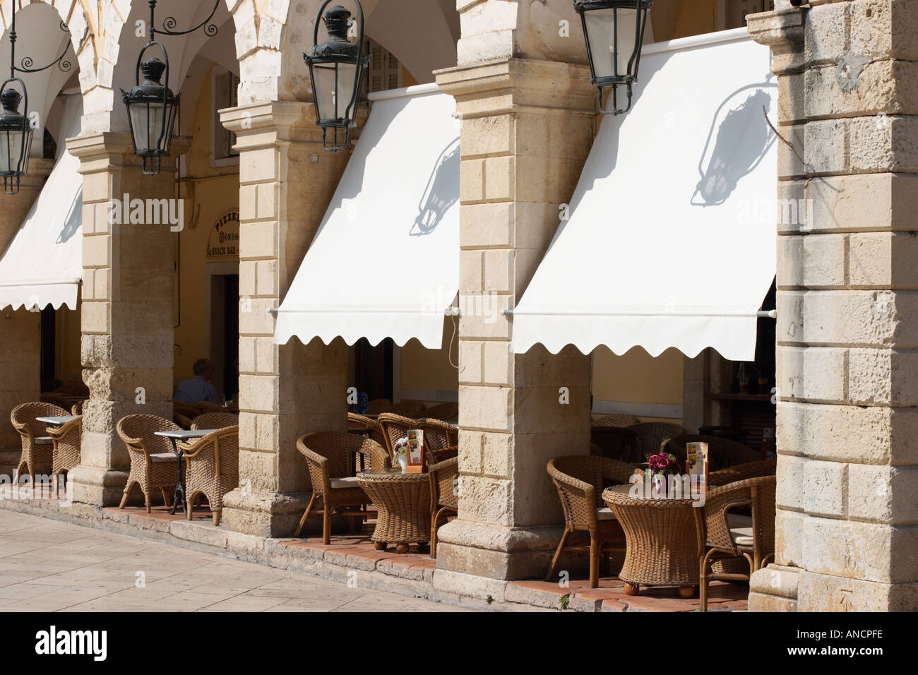 Cafe in Liston building complex at the Spianada square. Kerkyra old town, Corfu, Greece. Stock Photo