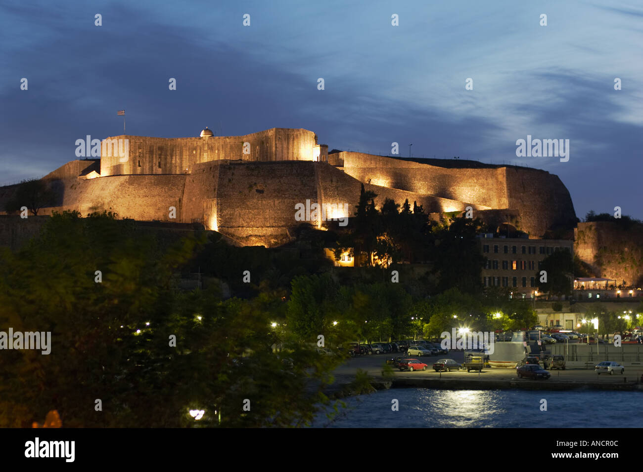 The New Fortress illuminated at night. Kerkyra town, Corfu, Greece. Stock Photo