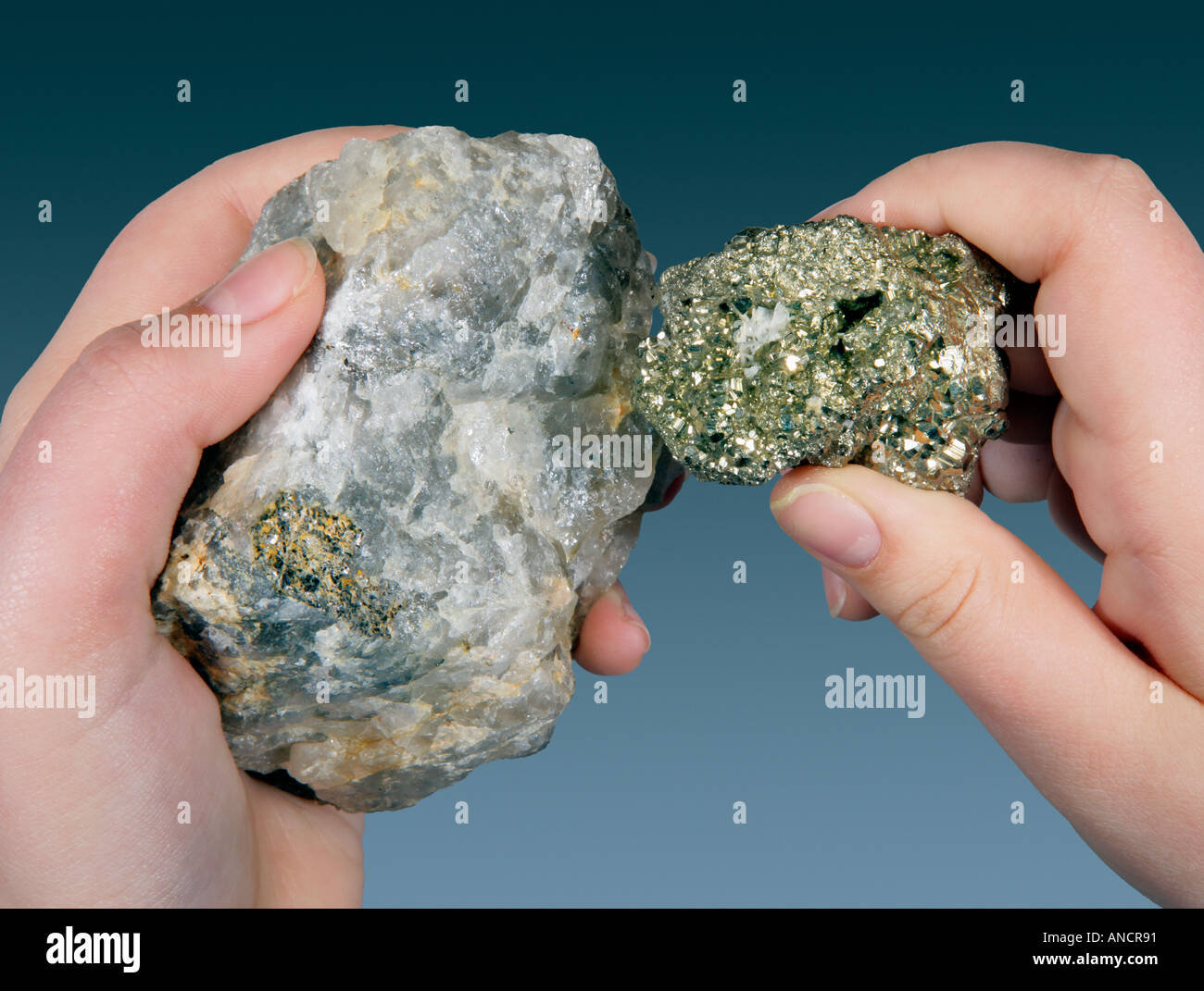 Moh s Hardness Test Scratching an Unknown Iron Pyrite on Quartz with a hardness of 7 Stock Photo