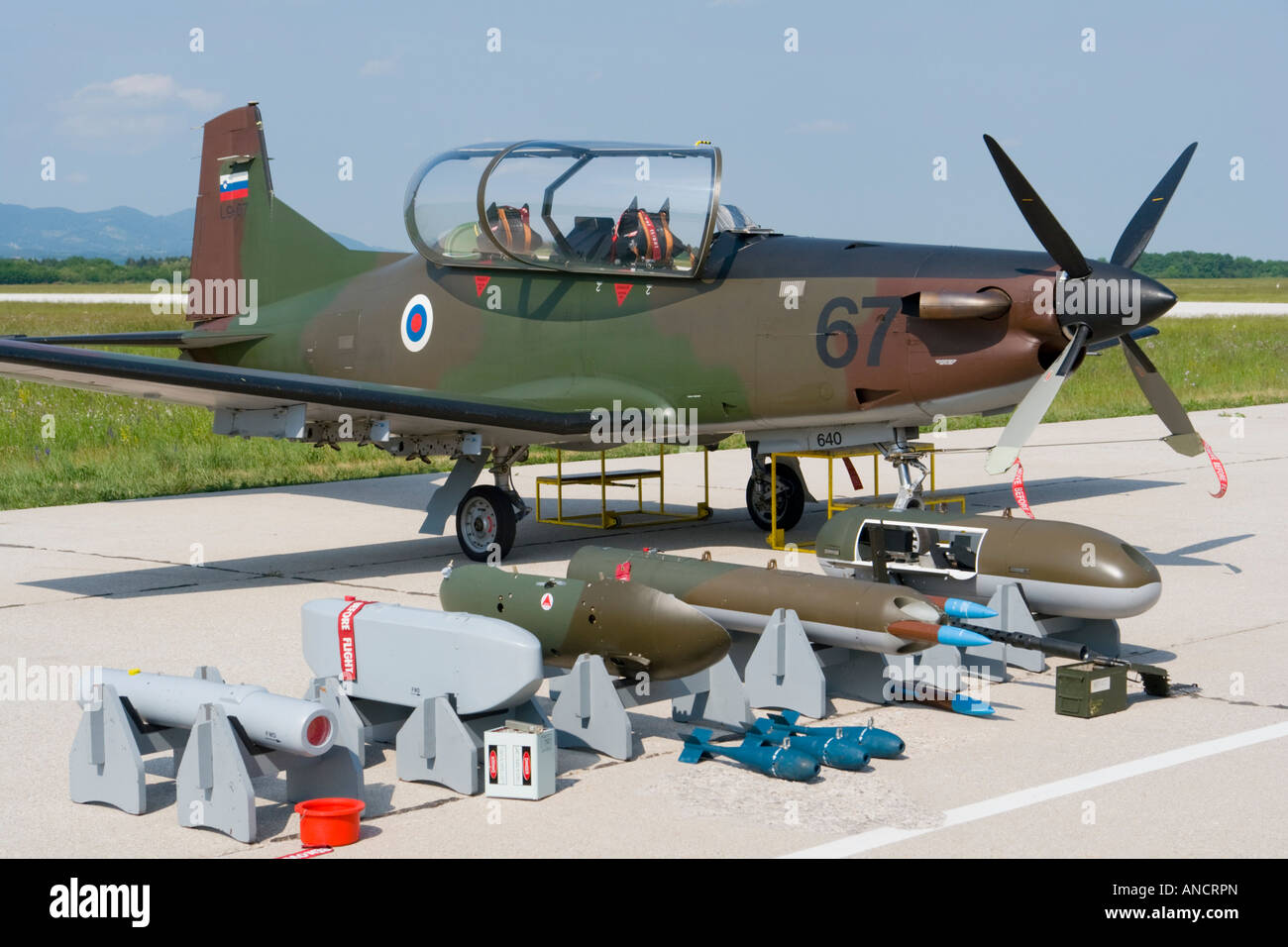 Slovenian Air Force Pilatus PC-9M on display with selection of optional  armament and opened cockpit canopy, Cerklje AF base Stock Photo - Alamy
