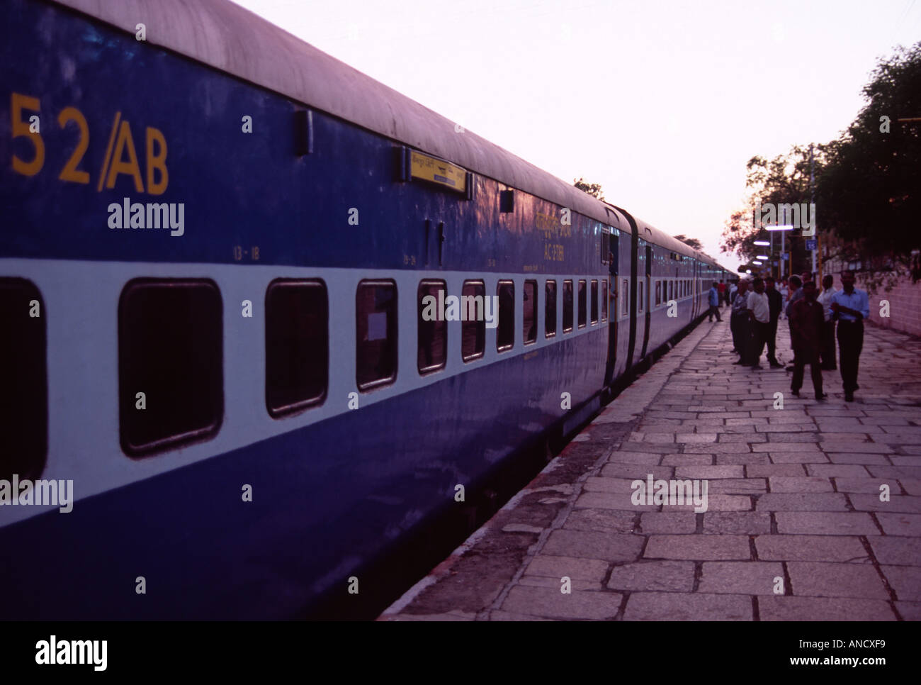 Indian train at platform Stock Photo