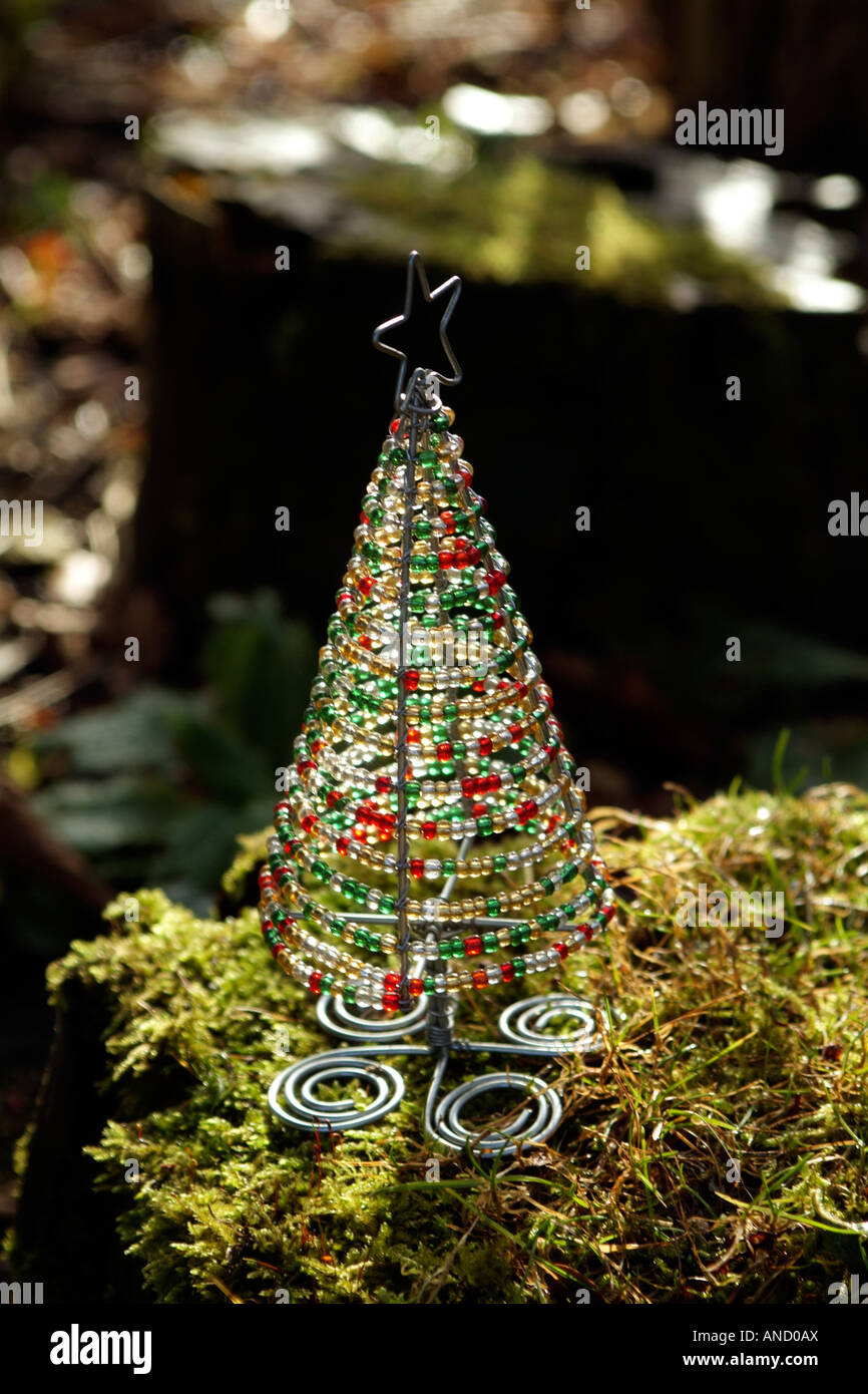 Garden Christmas Tree Decoration Made with Wire and Beads sitting ...