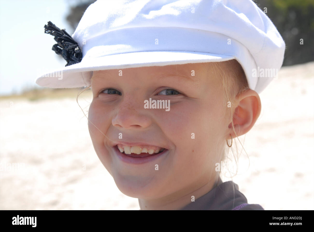 Fashionable little girl wearing cap hires stock photography and images