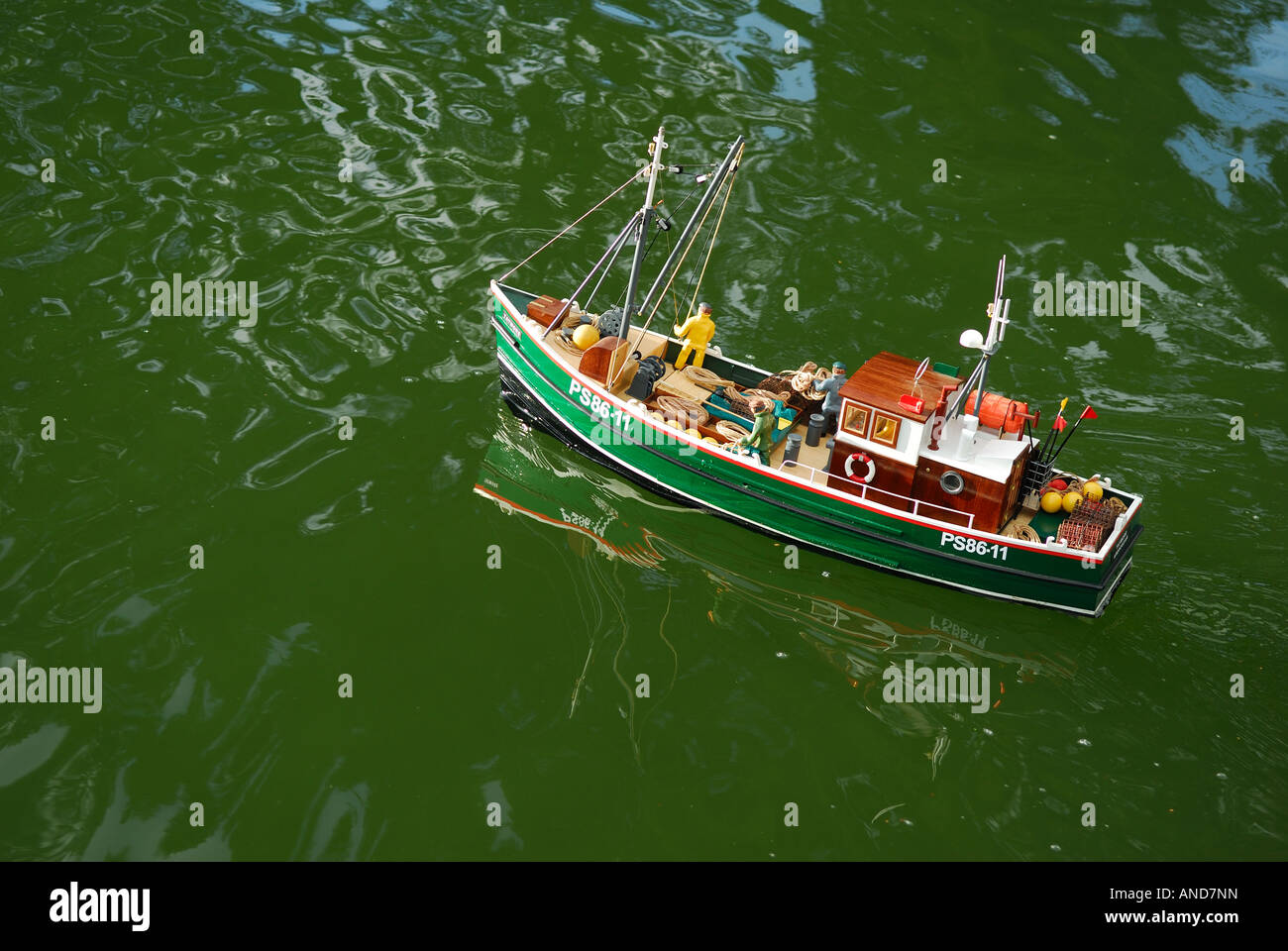 Remote control fishing boat Stock Photo - Alamy