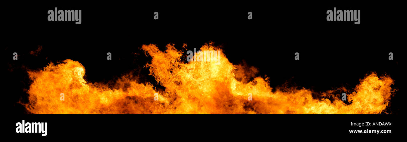 Massive wall of fire and flames on a black background Huge XXL file Stock Photo