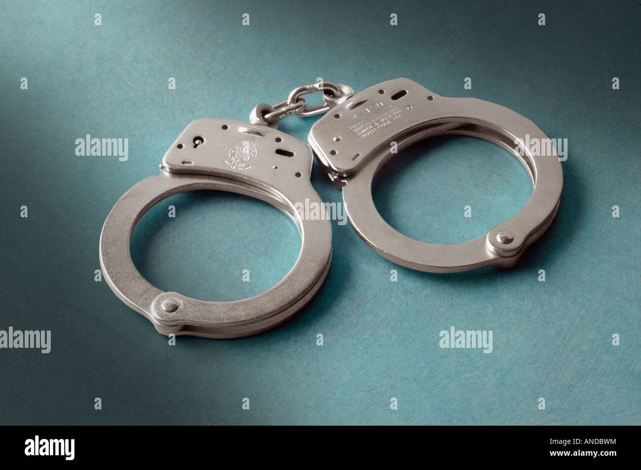 A pair of police handcuffs Stock Photo