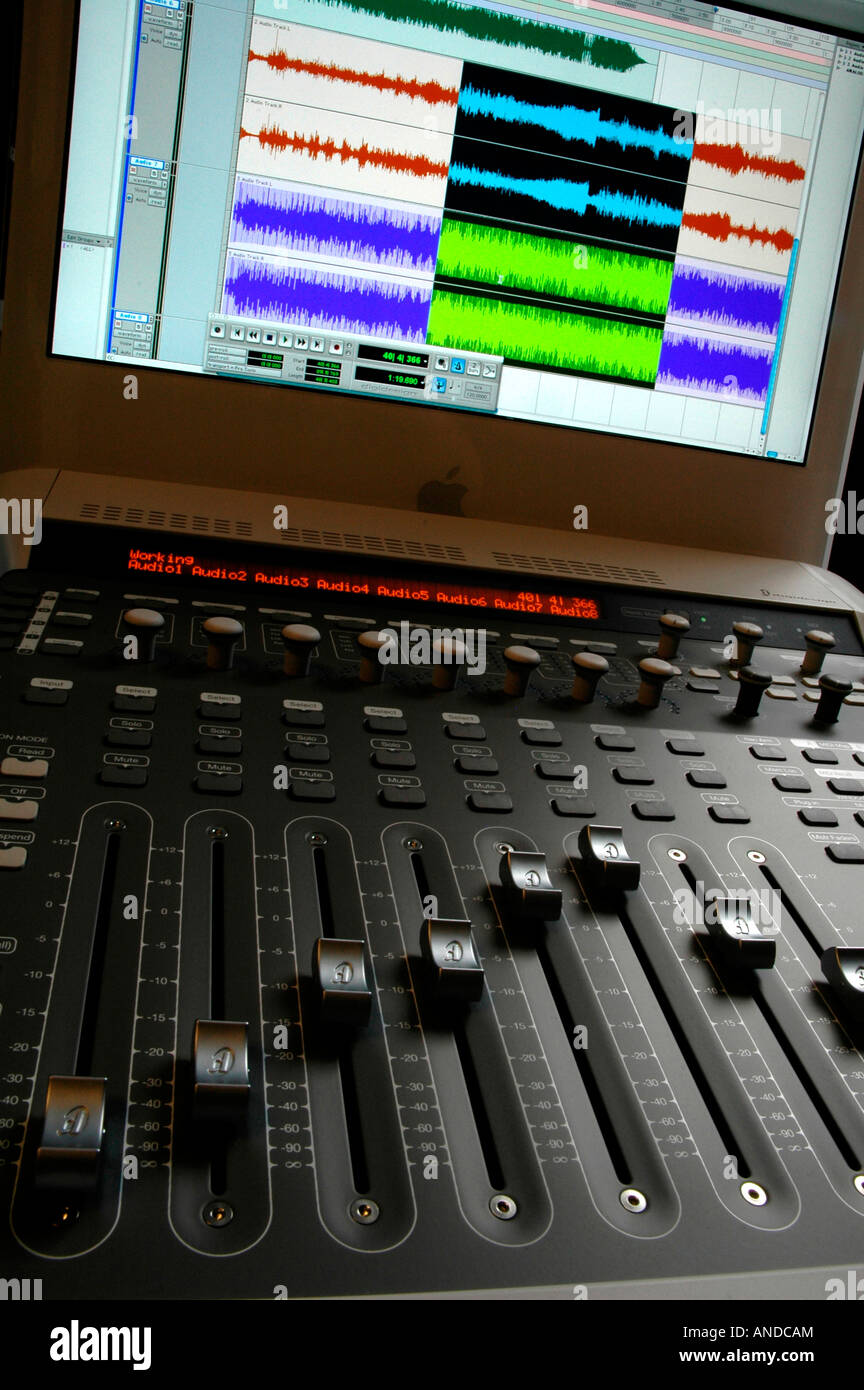Audio mixing mixer board sliders and wave graphics from a professional