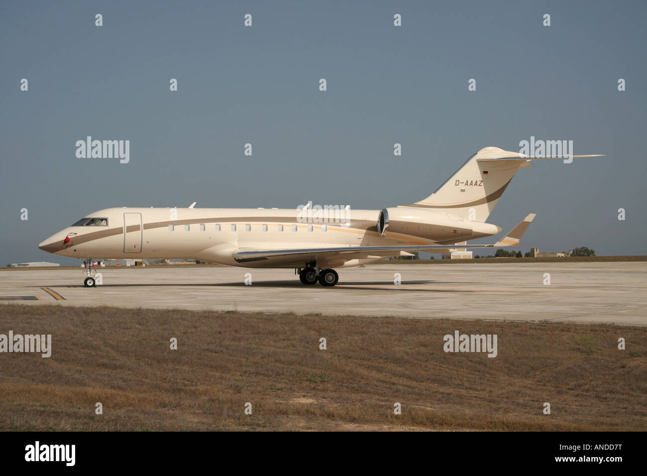Bombardier Global Express large business jet plane parked on the ground. Stock Photo