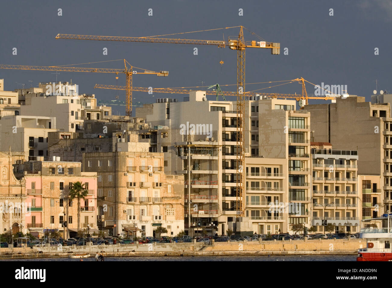 Construction activity in Sliema, Malta. Property development and economic growth in a densely populated country. Stock Photo