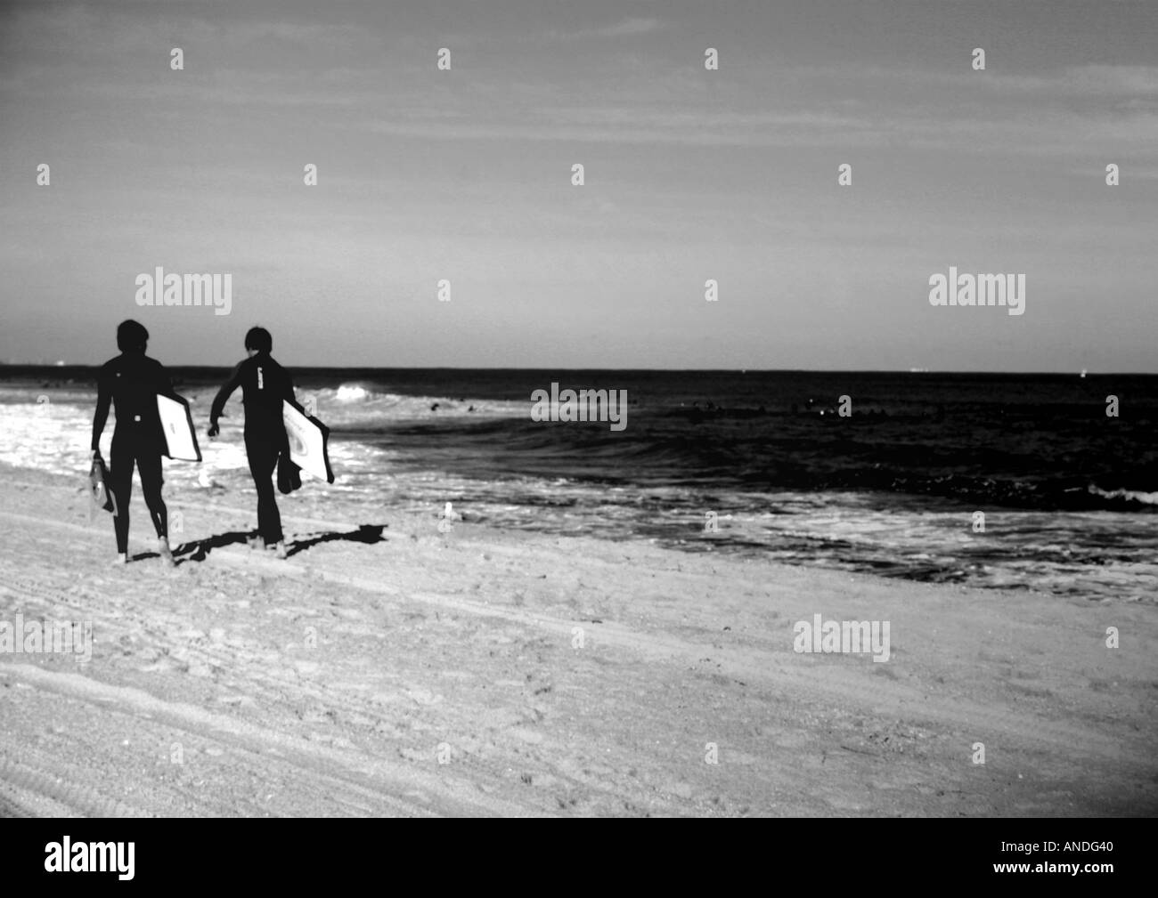 Surfers on Trigg Beach Perth Australia Stock Photo