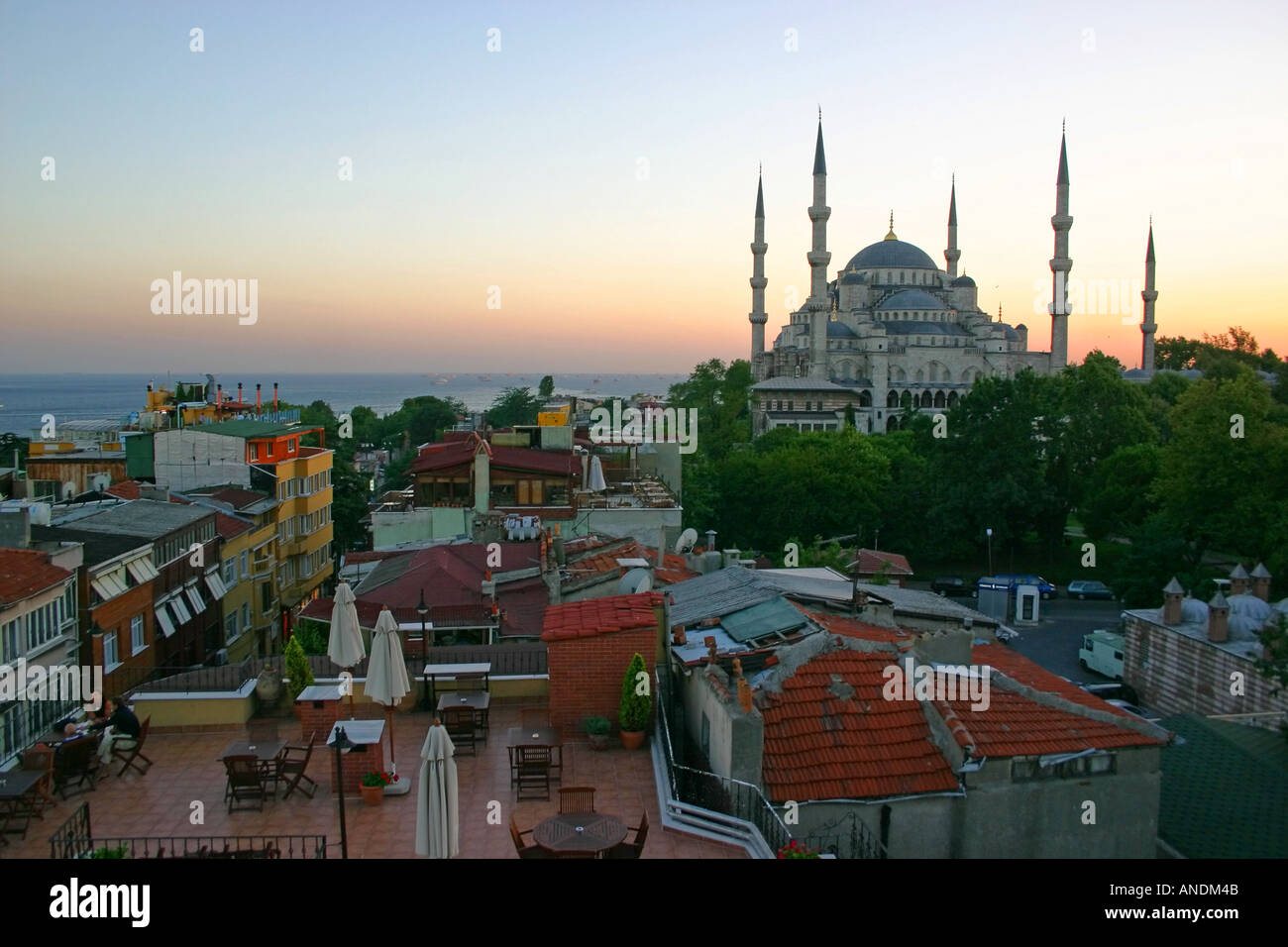 Sunset over Sultan Ahmet Camii Blue Mosque and rooftops in Istanbul ...