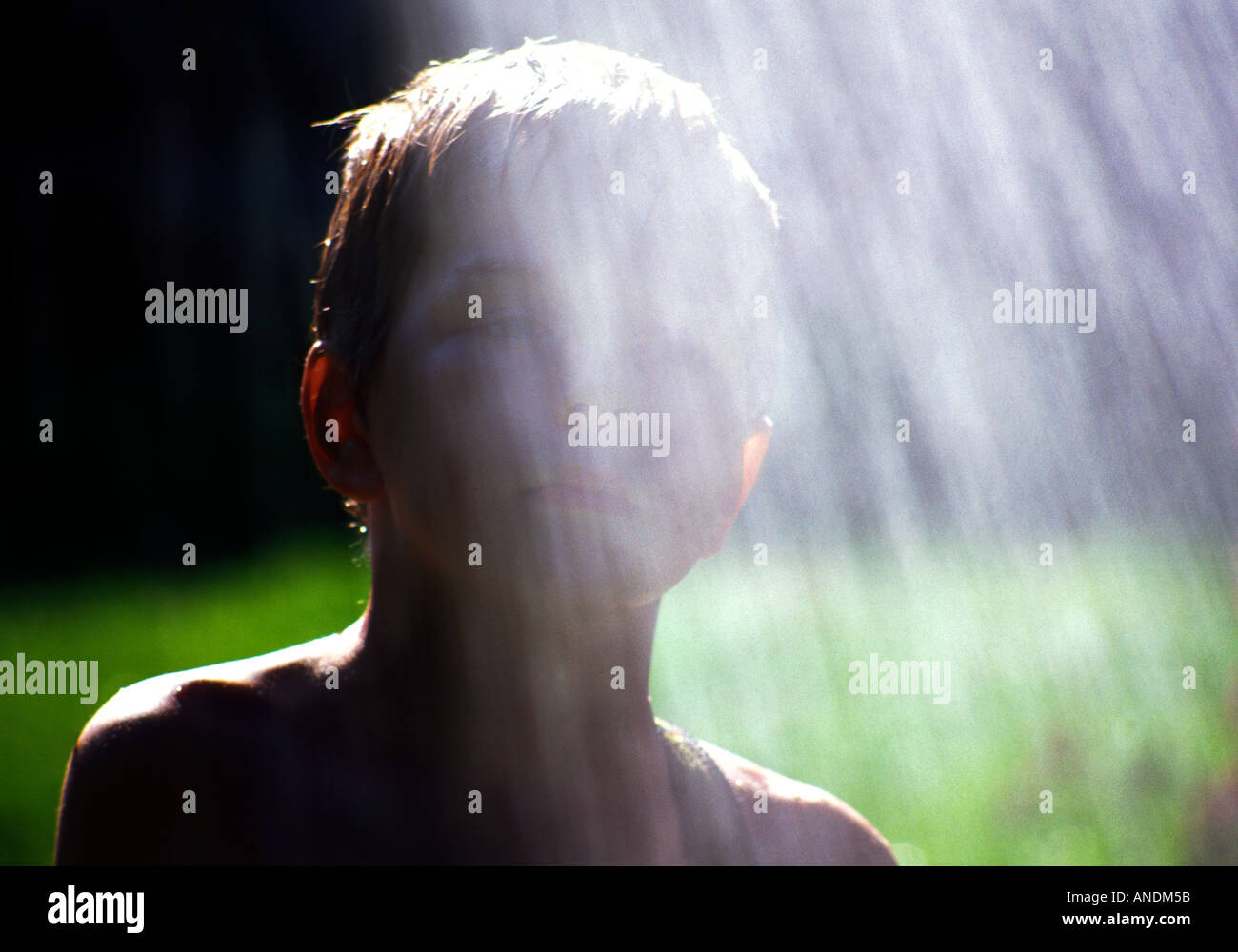 Boy splashing water on face hi-res stock photography and images - Alamy