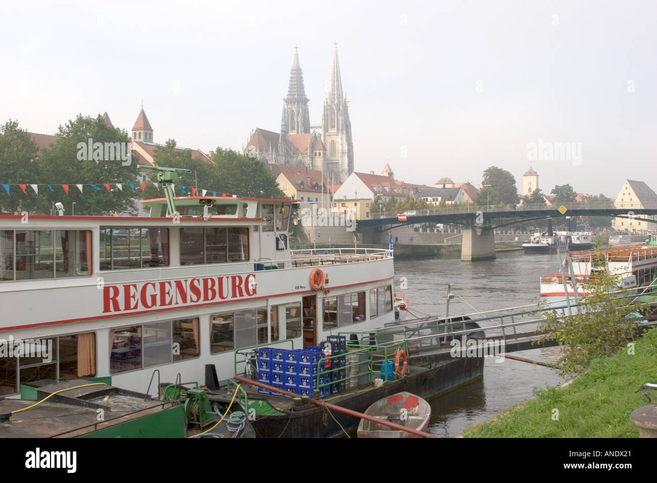 A tourist cruise boat preparing for the day at the ancient city of Regensburg on the Danube River Germany Western Europe Stock Photo