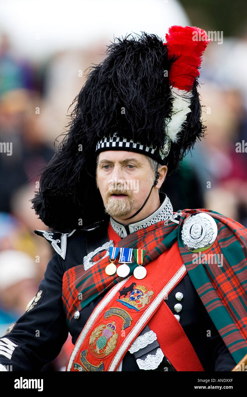 Drum Major of massed band of Scottish pipers at Braemar Games Highland Gathering Scotland Stock Photo