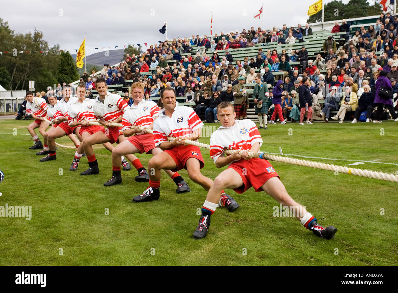 Men compete in Tug Of War contest at the Braemar Games Highland Gathering Scotland UK Stock Photo