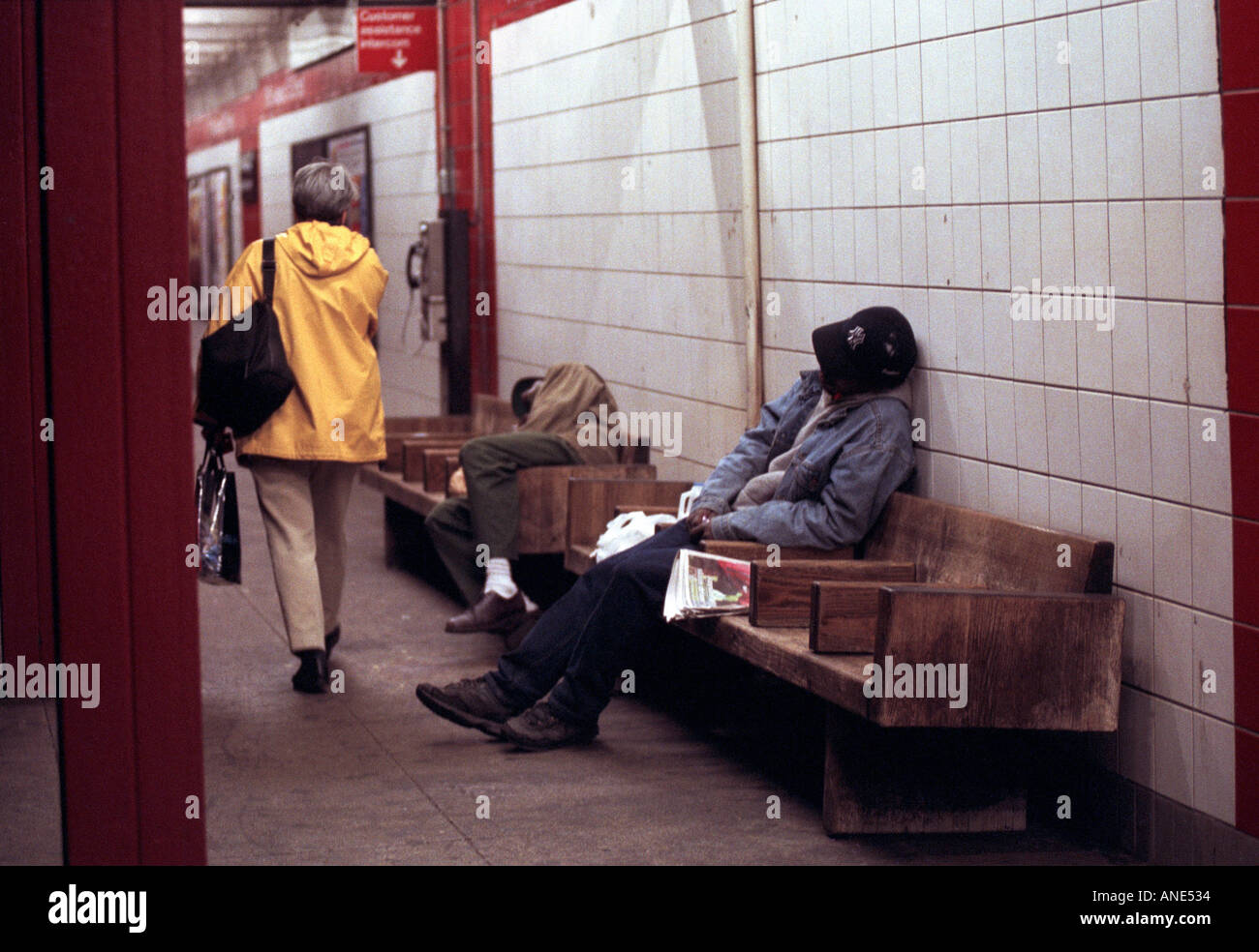 Homeless men asleep on a subway platform Stock Photo - Alamy