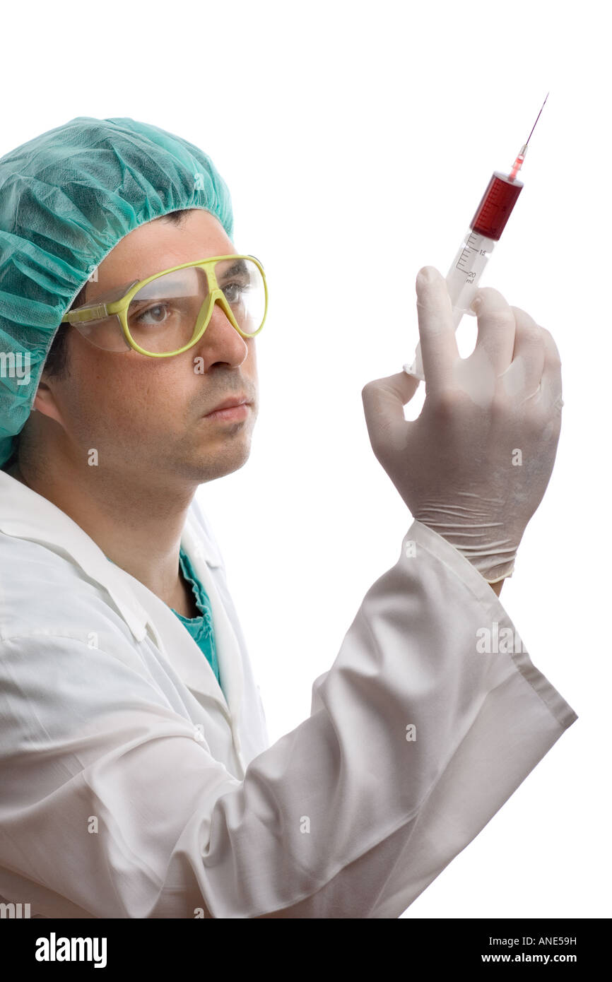 Doctor with a syringe medicine needle Stock Photo Alamy
