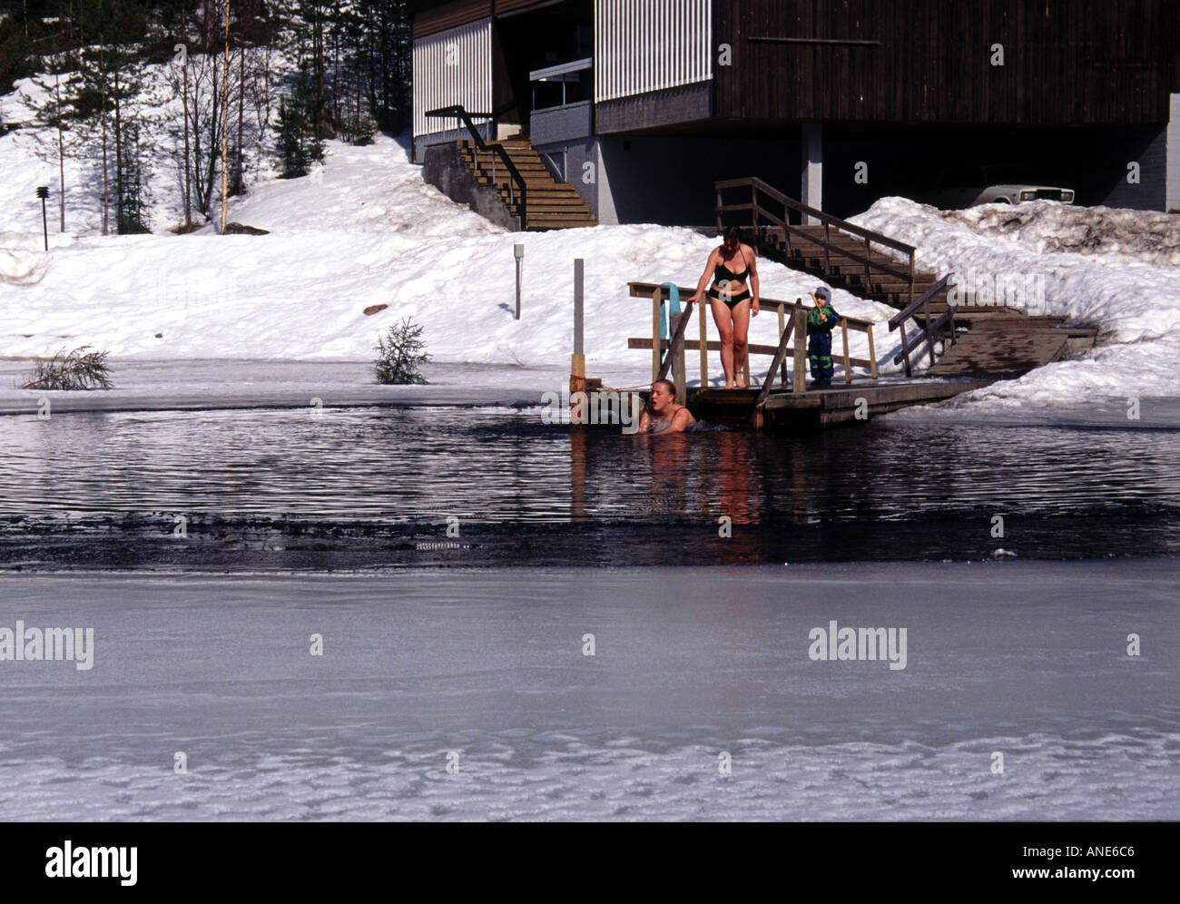 Finland Swimming in ice hole Jyvaskyla Finland Stock Photo Alamy