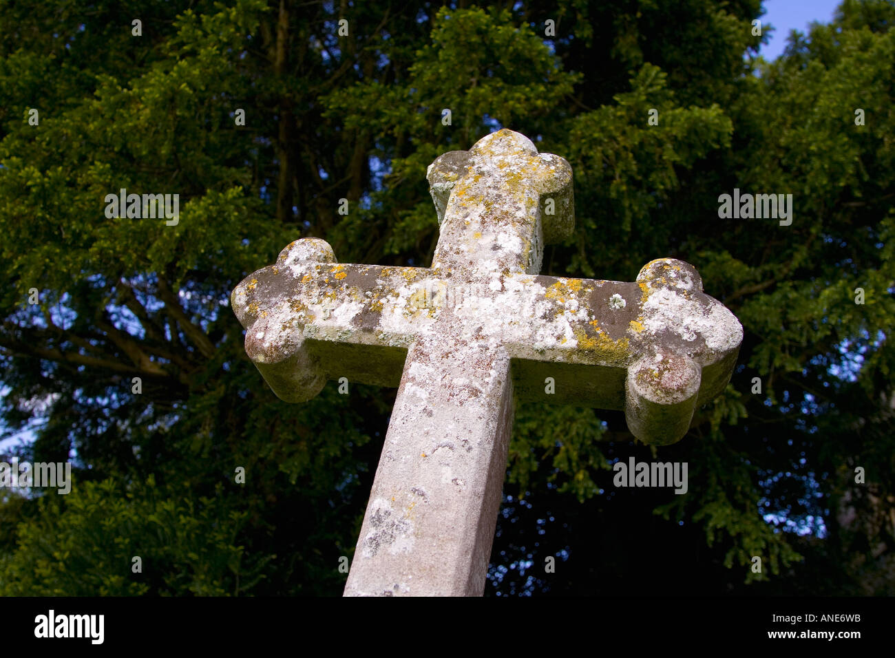 Gravestone in churchyard at All Saints Church in Church Lench Worcestershire UK Stock Photo