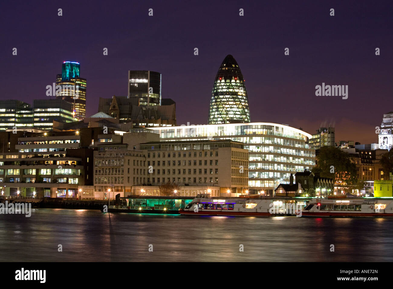 Financial district including 'the Gherkin' and 'Tower 42' at dusk. City of London, England Stock Photo